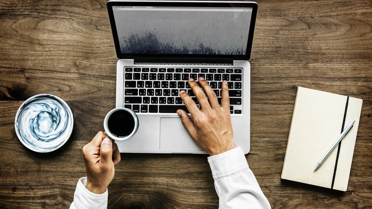 Student crafting winning scholarship application essay