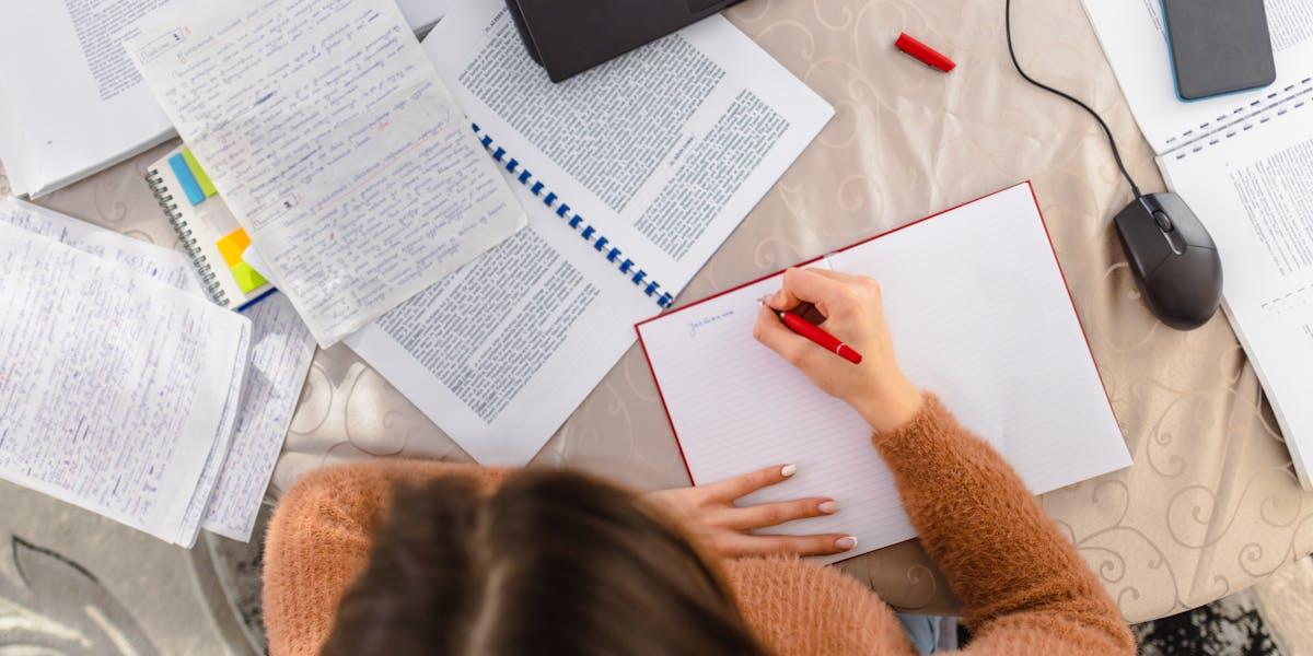 Young woman improving listening comprehension using effective language learning techniques